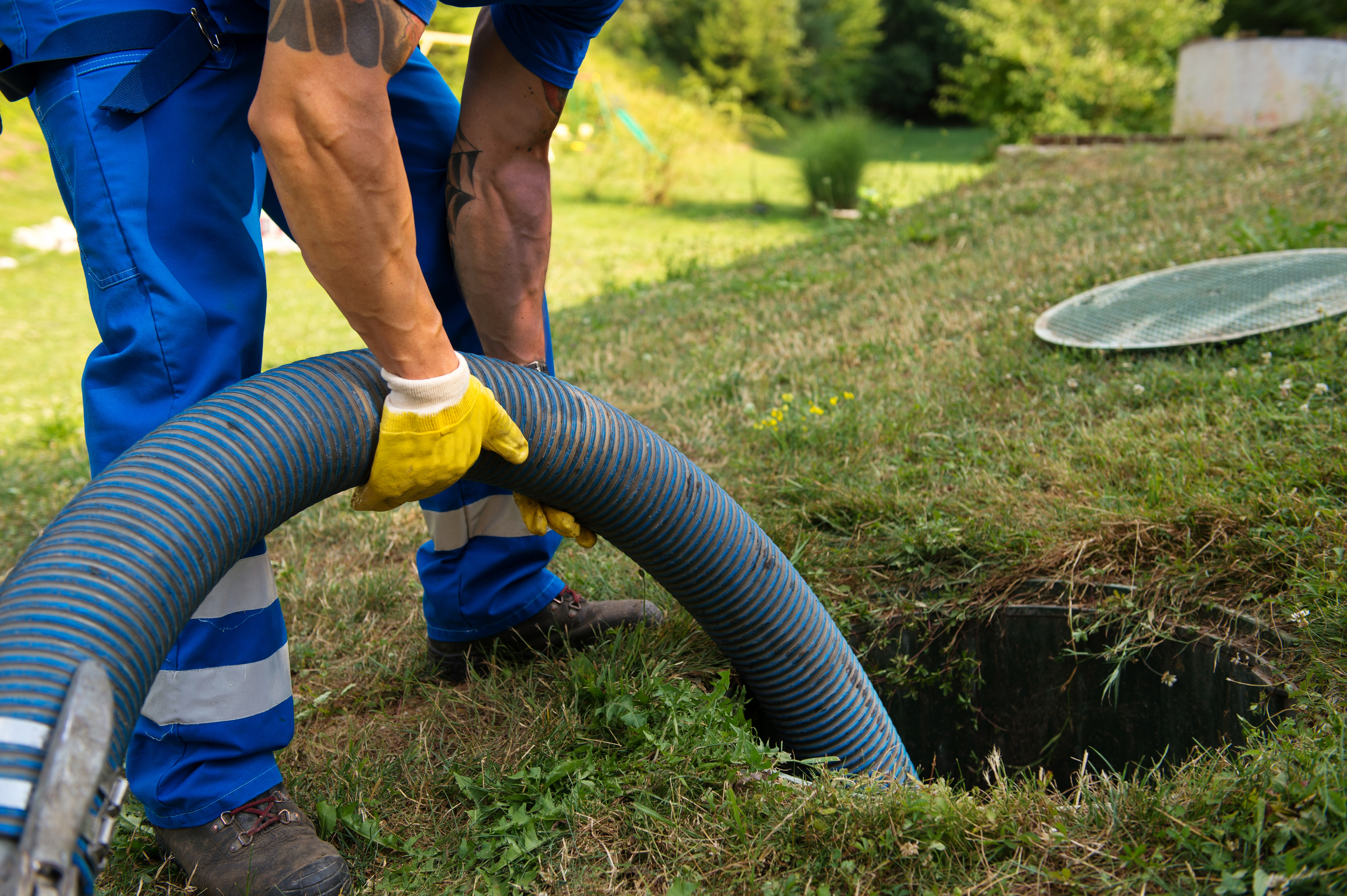 Man Holding Hose